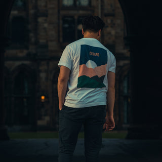 Cyrano wearing t-shirt